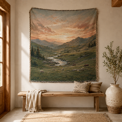 Alpine valley pasture woven blanket displayed as textile wall art above a rustic bench