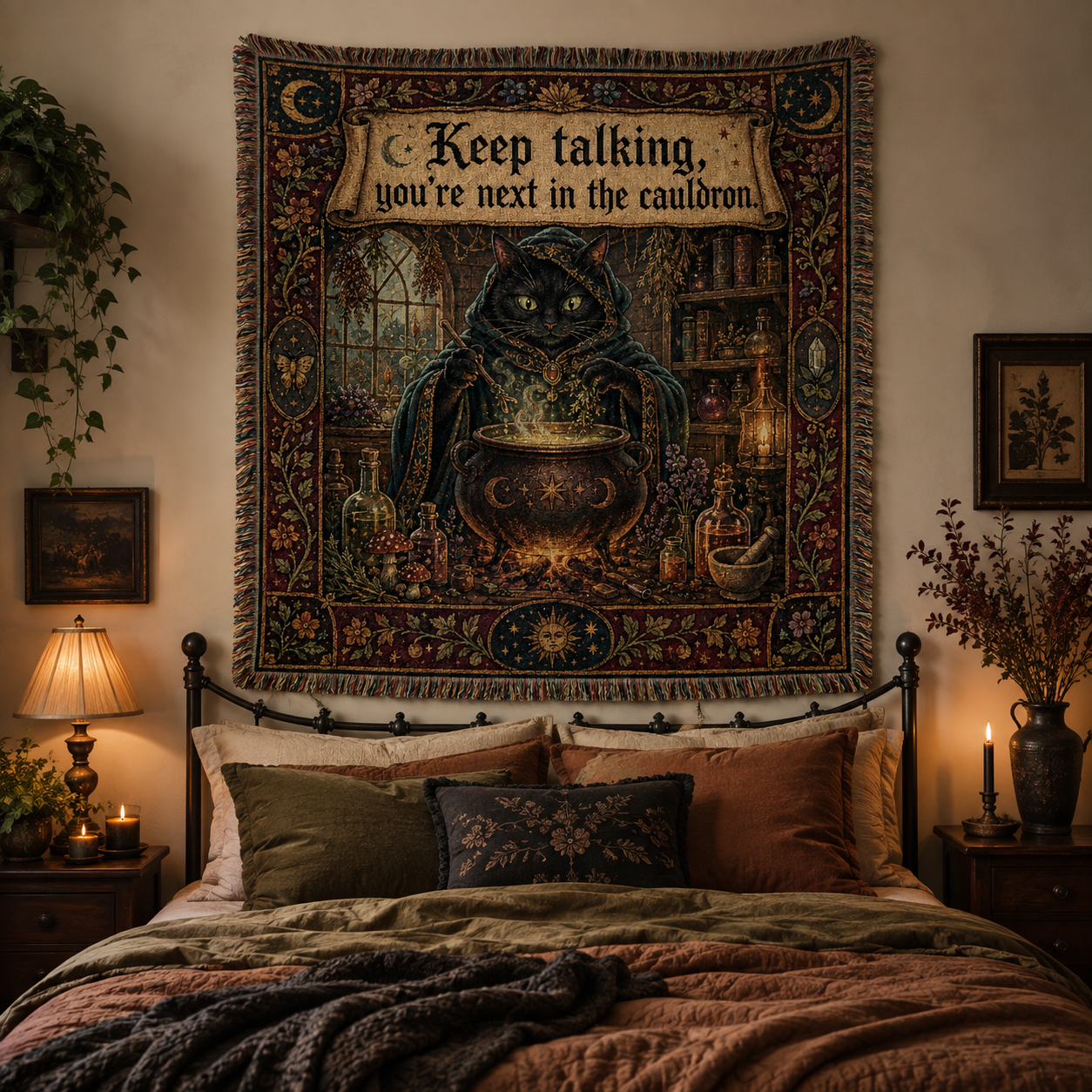 Black cat cauldron woven tapestry displayed above a cozy gothic cottage bedroom