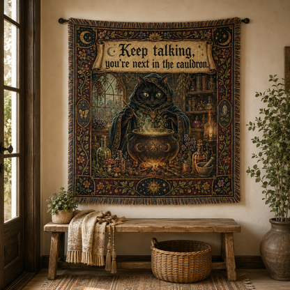 Black cat cauldron woven tapestry hanging above a rustic bench in a boho entryway
