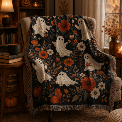 Ghost and autumn flower woven Halloween blanket in a cozy reading nook