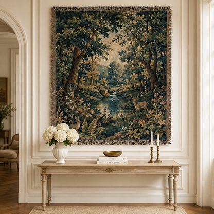 Enchanted woodland woven wall tapestry with deer, rabbit and river displayed above an elegant console table