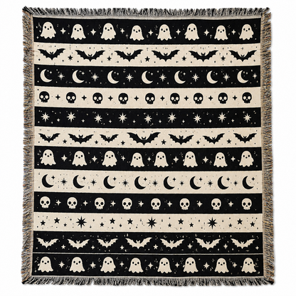 Black and ivory Halloween woven throw blanket with ghosts bats moons skulls stars and fringe