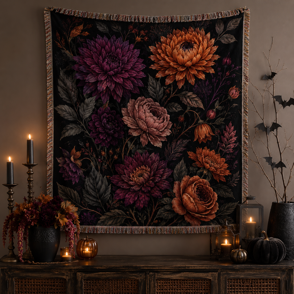 Gothic floral woven blanket displayed as dark botanical Halloween wall decor above candles pumpkins and a vintage console