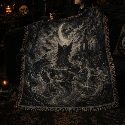 Person relaxing with a gothic moon ritual woven throw blanket