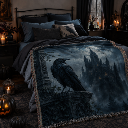 Gothic raven haunted castle woven blanket styled across dark Halloween bedroom with soft folds and fringe