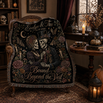Gothic skeleton couple woven blanket draped over a vintage Halloween reading chair