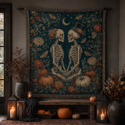 Gothic skeleton couple woven blanket hung as a wall tapestry above a rustic bench with lanterns and pumpkins