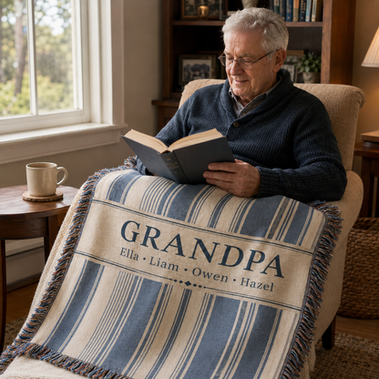 Grandpa reading with a personalized striped woven blanket
