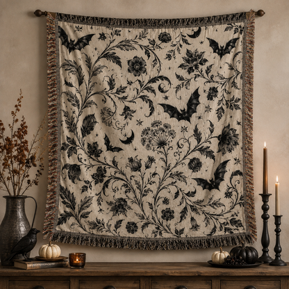 Halloween gothic botanical woven blanket displayed as wall decor with bats and florals