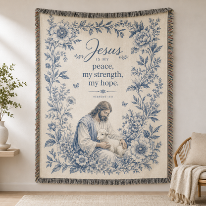 Jesus is my peace woven blanket with blue floral design, Jesus holding lamb, and fringe