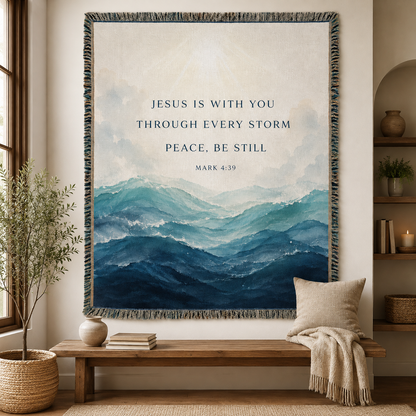 Mark 4:39 Christian woven blanket displayed as wall decor with blue ocean wave artwork