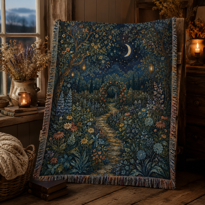 Moonlit secret garden woven blanket displayed in a warm rustic interior