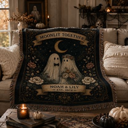 Personalized ghost couple woven blanket styled on a cozy Halloween living room sofa