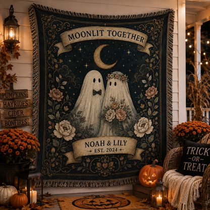 Personalized ghost couple woven blanket hanging on a decorated autumn Halloween porch