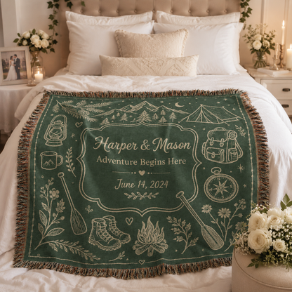 Personalized adventure wedding woven blanket styled across a romantic bedroom bed