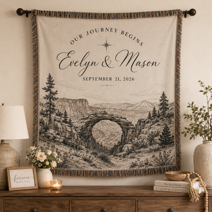 Personalized adventure wedding woven blanket displayed as wall decor above a wooden console