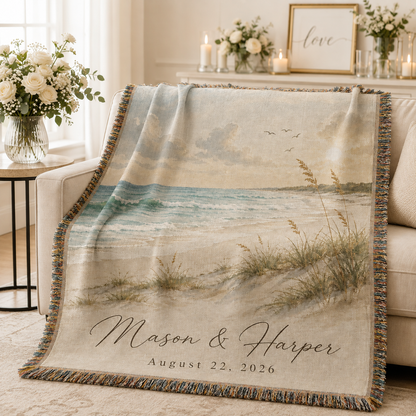 Personalized coastal wedding woven blanket softly draped on a sofa