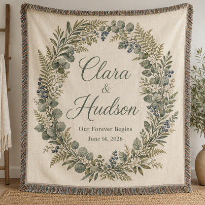 Personalized botanical wedding woven blanket with Clara and Hudson names and wedding date