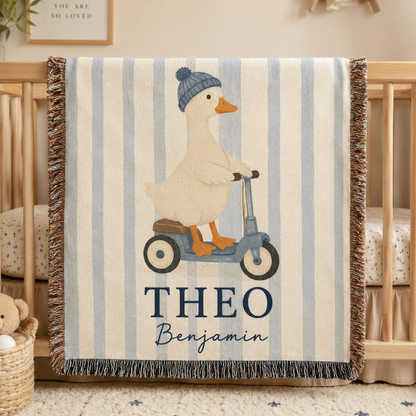 Personalized baby boy woven blanket with duck on scooter, blue stripes, fringe and custom name