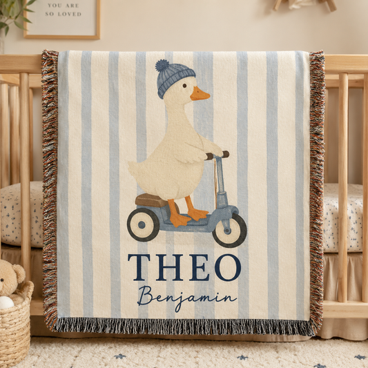 Personalized baby boy woven blanket with duck on scooter, blue stripes, fringe and custom name