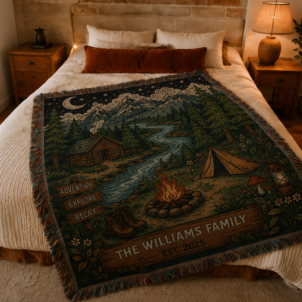 Personalized family camping woven blanket styled across a cozy rustic bedroom bed