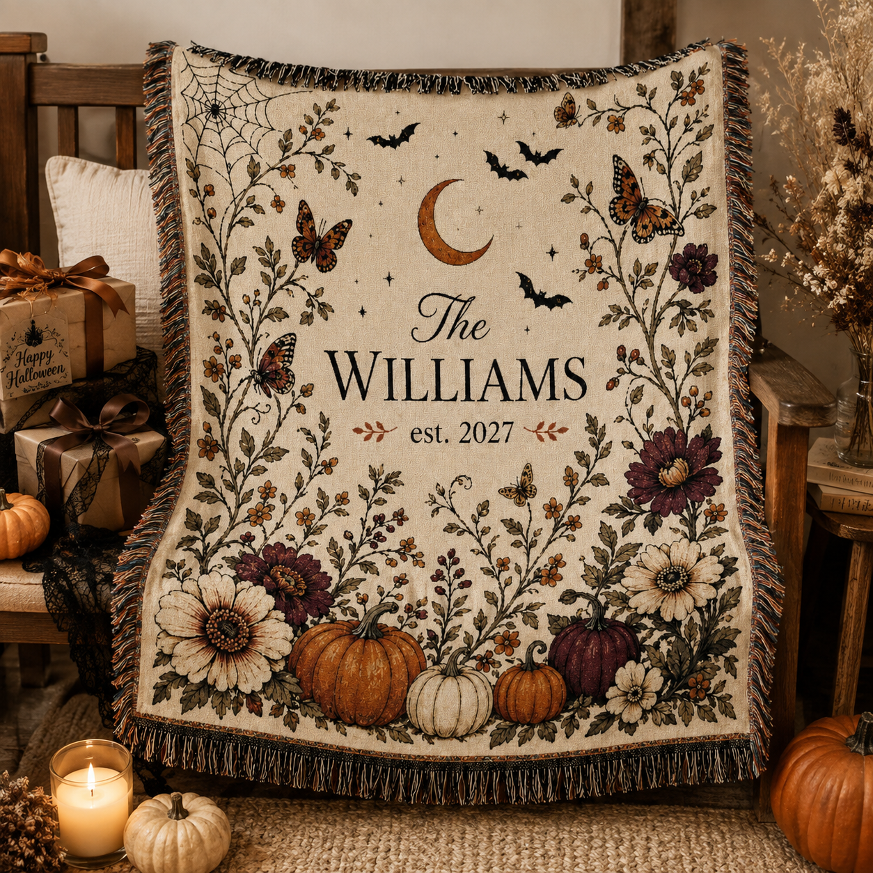 Personalized family name Halloween woven blanket presented as an autumn housewarming gift with pumpkins and candles