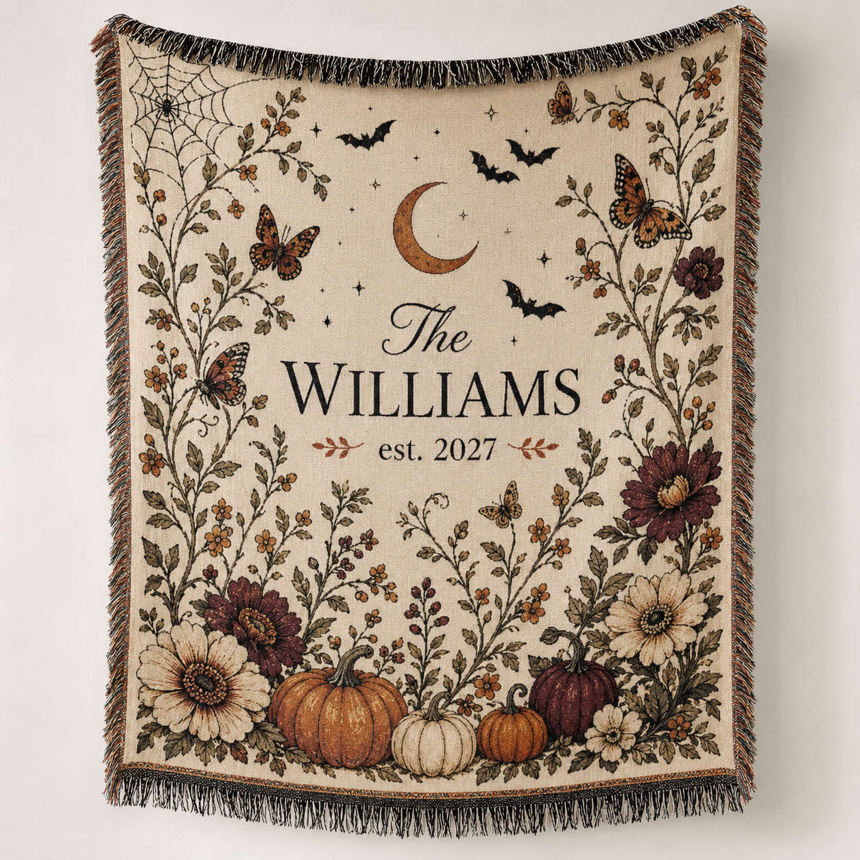 Personalized family name Halloween woven blanket with pumpkins, floral vines, bats, crescent moon and fringe