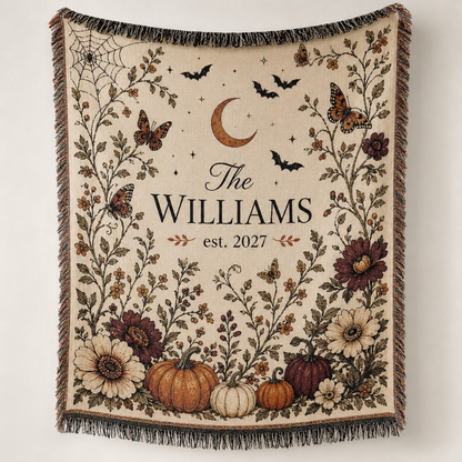Personalized family name Halloween woven blanket with pumpkins, floral vines, bats, crescent moon and fringe