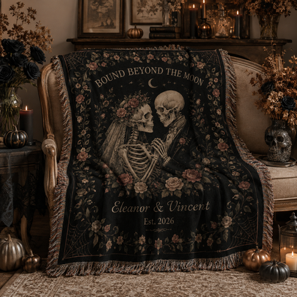 Soft personalized gothic skeleton wedding woven blanket draped over a vintage bench with elegant Halloween decor