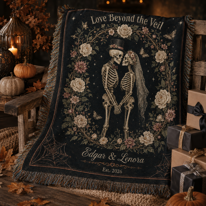 Personalized gothic wedding skeleton couple woven blanket displayed with Halloween gifts, pumpkins and candles