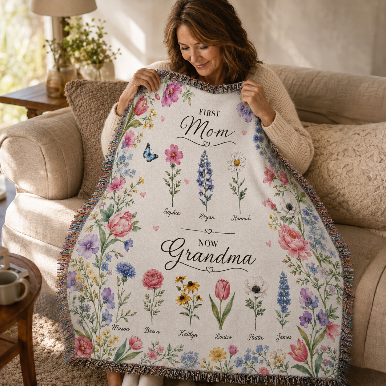 Grandma holding personalized birth flower blanket