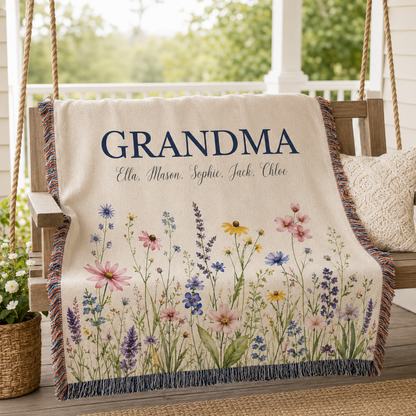 Personalized Grandma meadow wildflower woven blanket styled on a porch swing