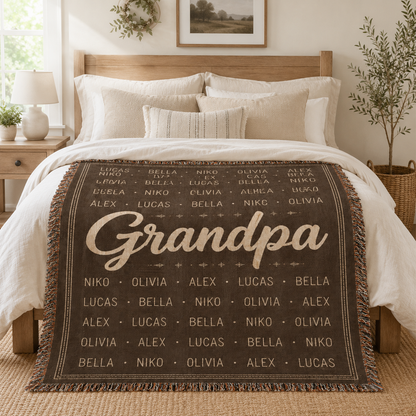 Personalized Grandpa name pattern woven blanket displayed on a cozy neutral bedroom bed