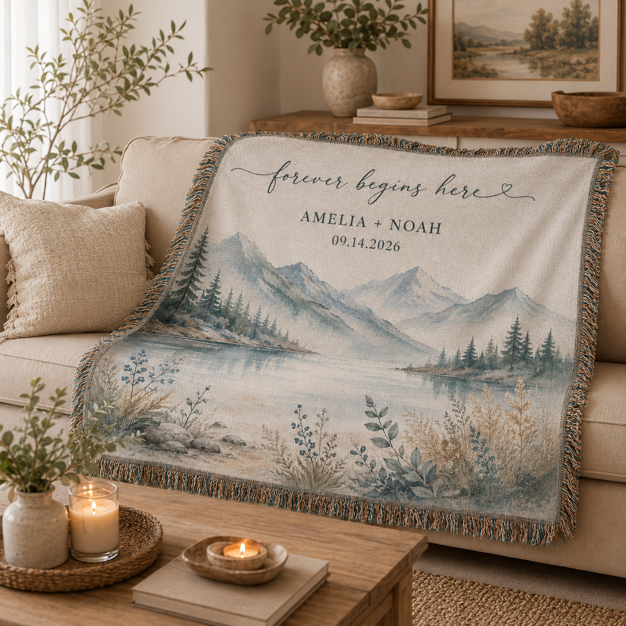Personalized mountain lake woven blanket styled on a neutral living room sofa