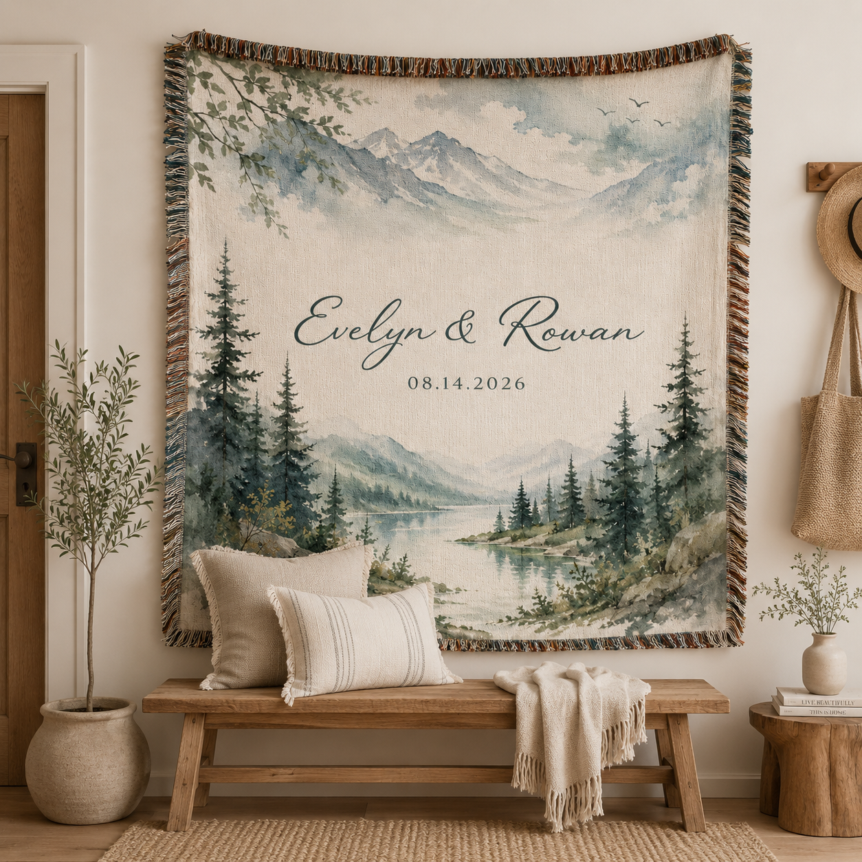 Personalized mountain lake woven blanket displayed as wall tapestry above a rustic wooden bench