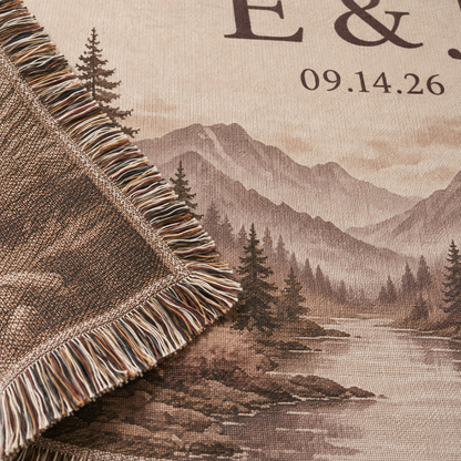 Macro close-up of woven texture and multicolor fringe on personalized mountain wedding blanket