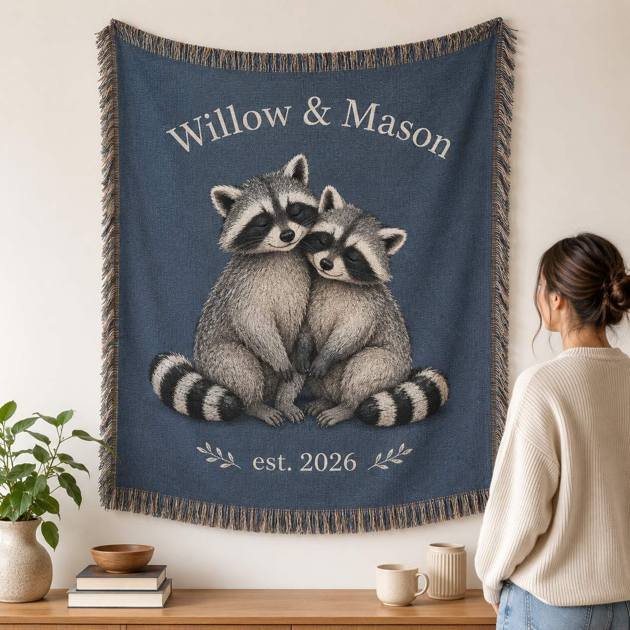 Personalized raccoon couple woven blanket with two names and established year displayed as wall tapestry