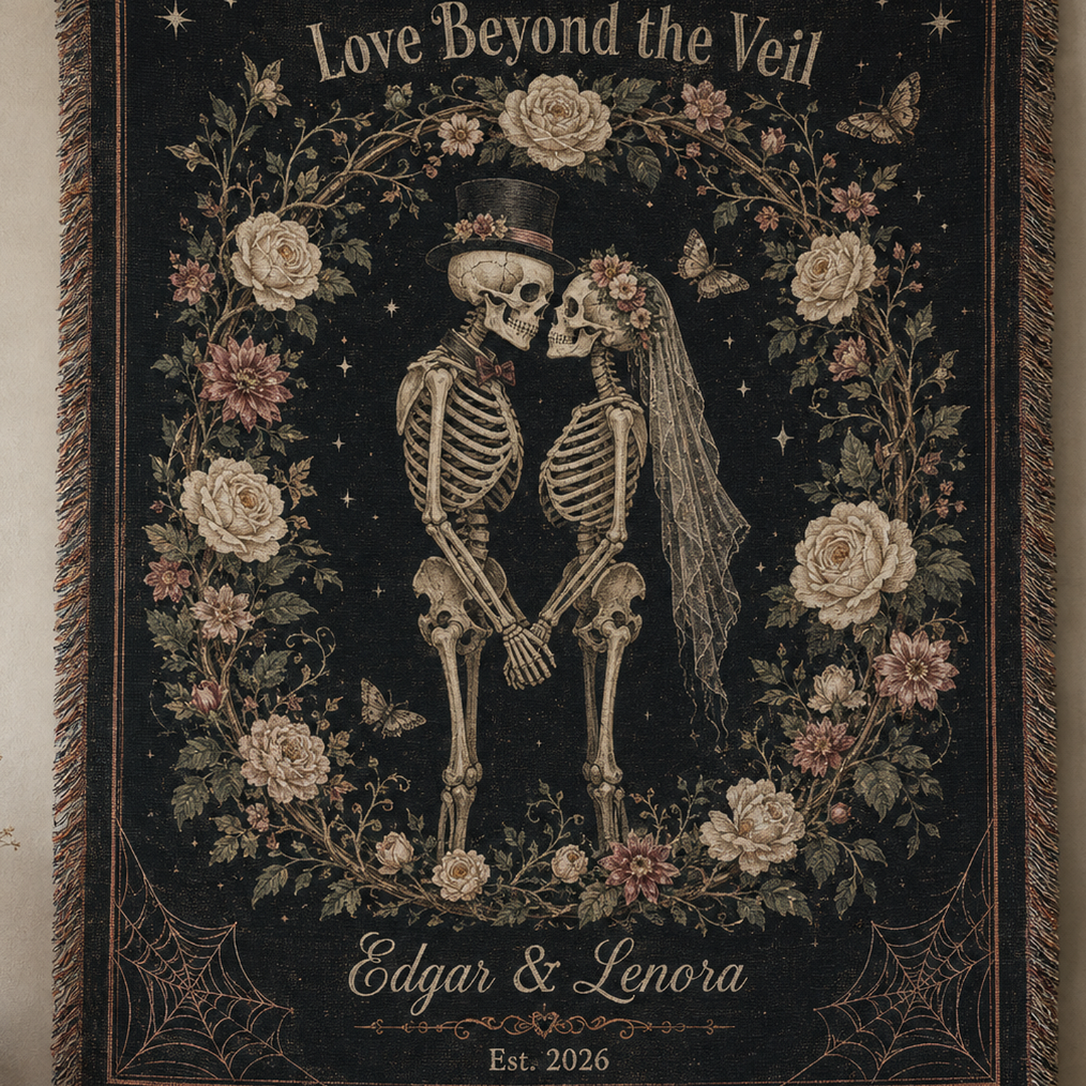 Close-up of personalized skeleton bride and groom woven blanket showing floral wreath, names, date and tapestry texture