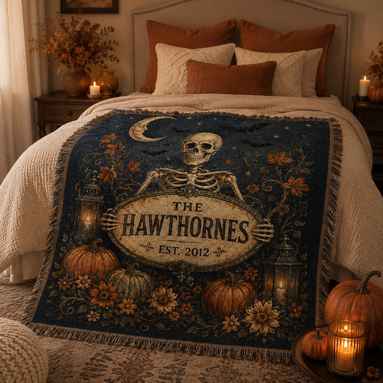 Personalized Halloween skeleton woven blanket displayed across a cozy autumn bed