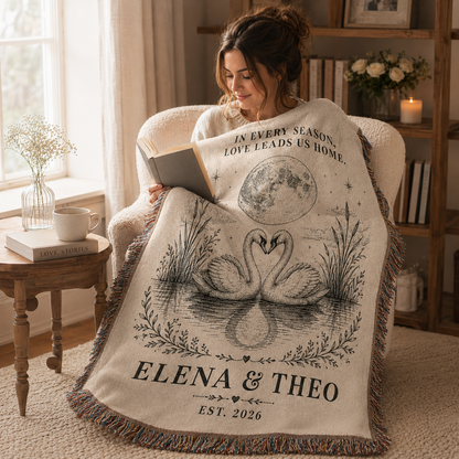 Personalized swan wedding woven blanket used in a cozy reading nook
