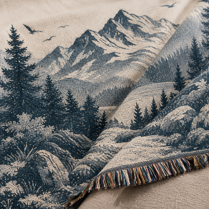 Macro close-up of woven texture and multicolor fringe on personalized mountain wedding blanket