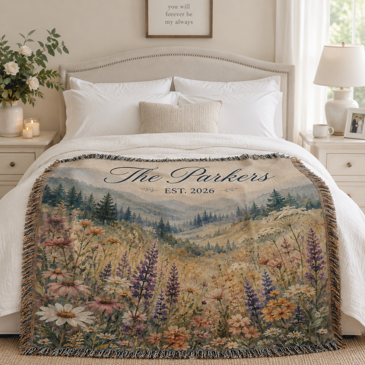 Personalized wildflower wedding woven blanket styled across a romantic bedroom bed