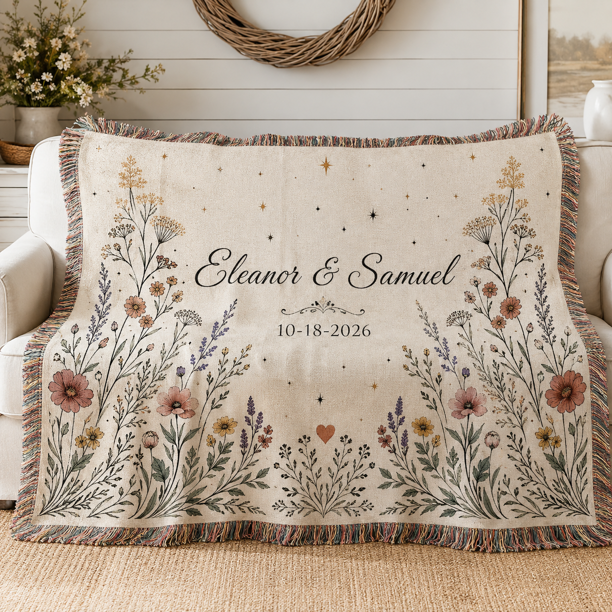 Personalized wildflower wedding woven blanket softly draped on a neutral sofa