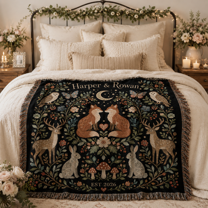 Personalized woodland fox wedding woven blanket styled across a romantic bedroom bed