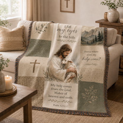 Psalm 121 Jesus and lamb woven blanket softly draped over a neutral sofa