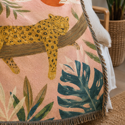 Close-up of tropical jaguar woven blanket texture and fringe