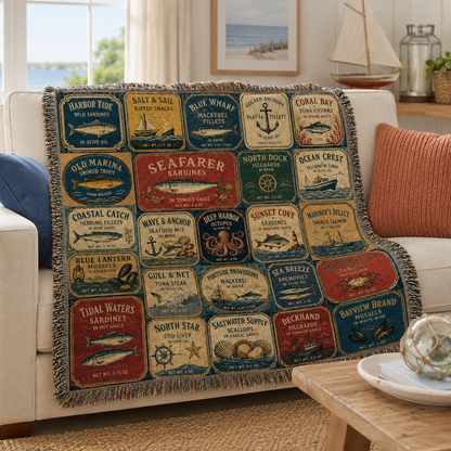 Vintage seafood label woven blanket draped over a cream sofa in a coastal living room