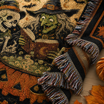 Macro close-up of Halloween woven blanket showing detailed yarn texture, witch artwork and multicolor fringe