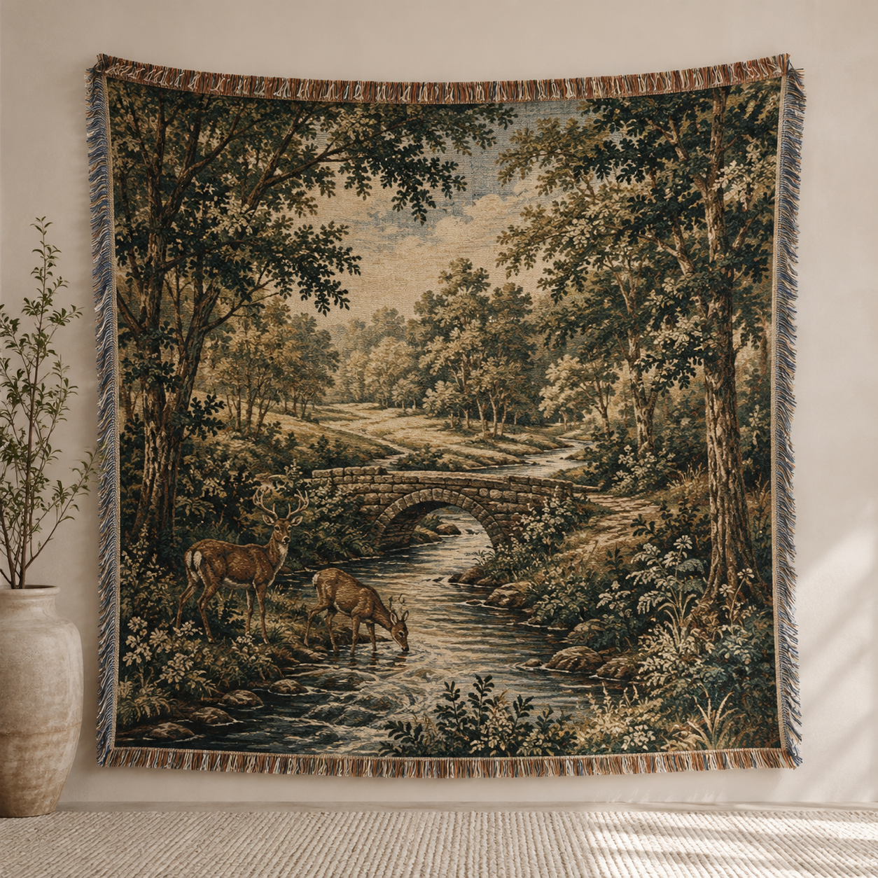 Woodland deer stream woven blanket shown full front with stone bridge and fringe