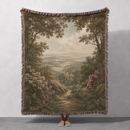 Woodland valley path woven blanket shown full front with botanical forest landscape and fringe